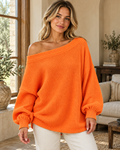 Full Size Waffle Knit Boat Neck Sweatshirt Plus Size in Orange-red — worn by an adult model in a warm architectural studio