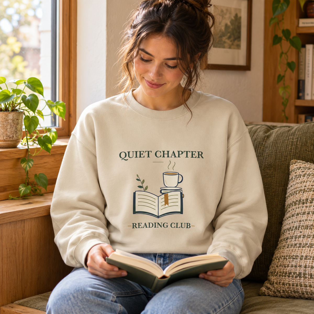 Quiet Chapter Reading Club Crewneck — person use: seated reading indoors; digitally styled supplier-based mockup