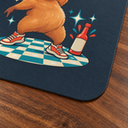 Spicy Disco Capybara Mouse Pad — closer printed surface and thin rounded edge on desk